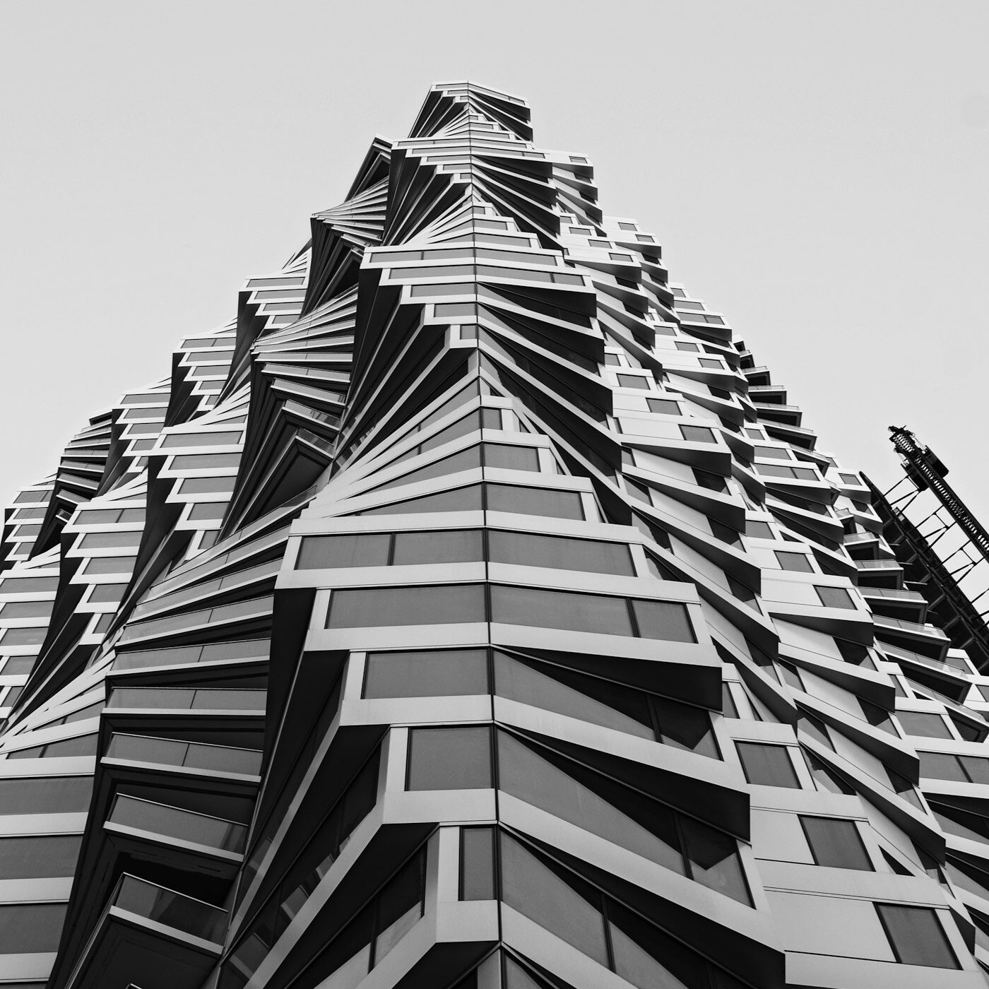 Black and white close view of a concrete building surface