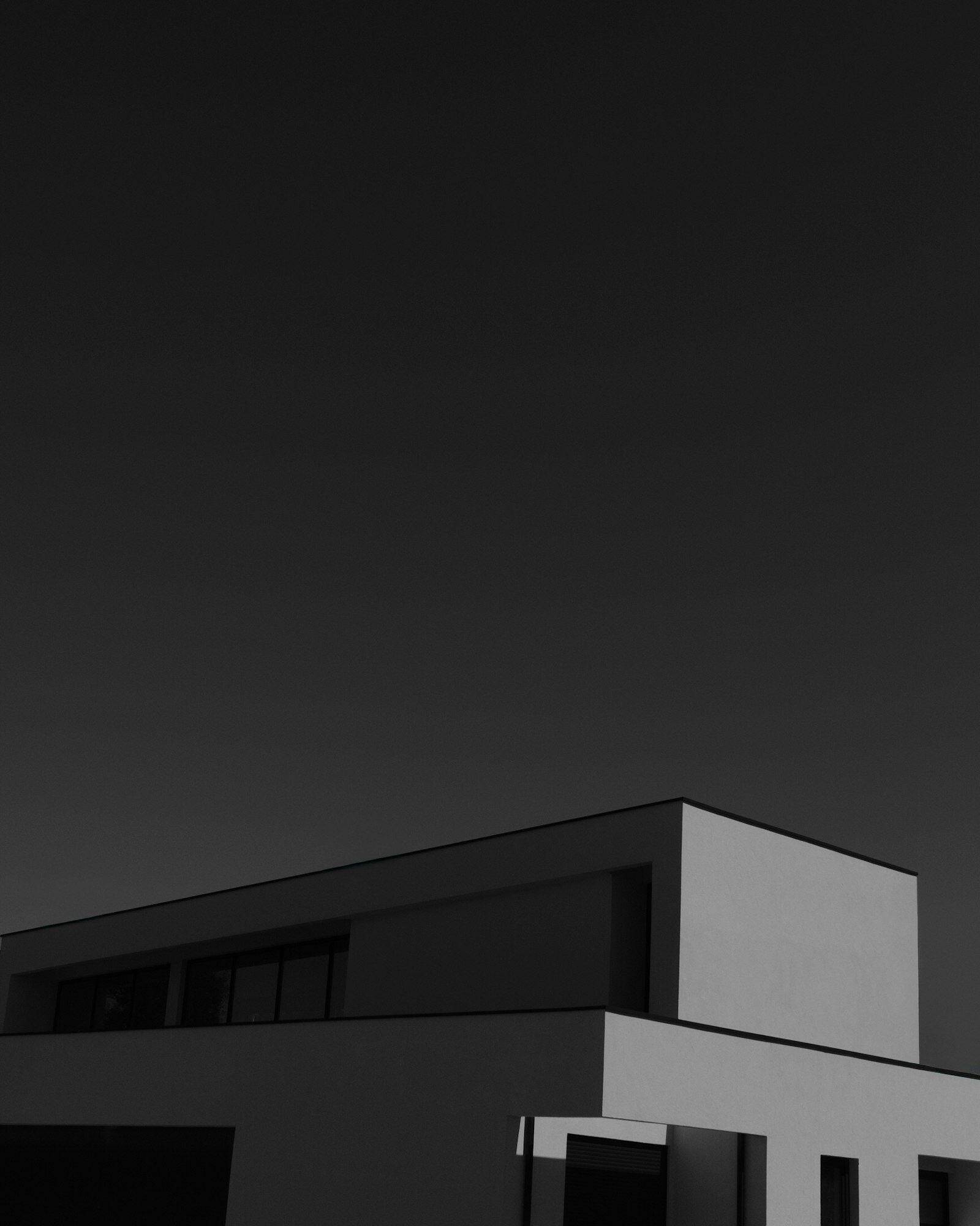 Geometric modern house photographed in black and white