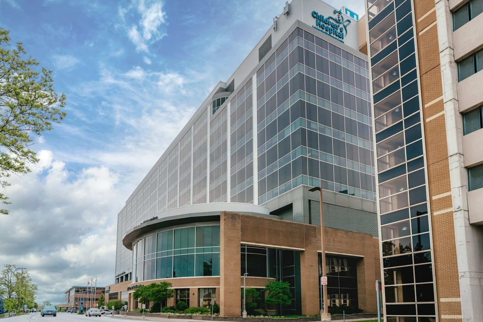 Modern commercial building with a curved glass entrance